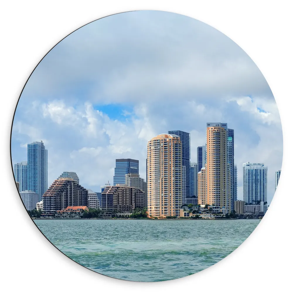 Dibond Muurcirkel - Skyline - Stad - Gebouwen - Water