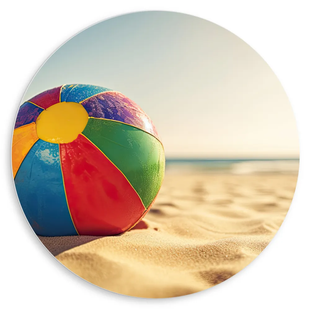 Dibond Muurcirkel - Kleurrijke Strandbal Liggend in het Zand