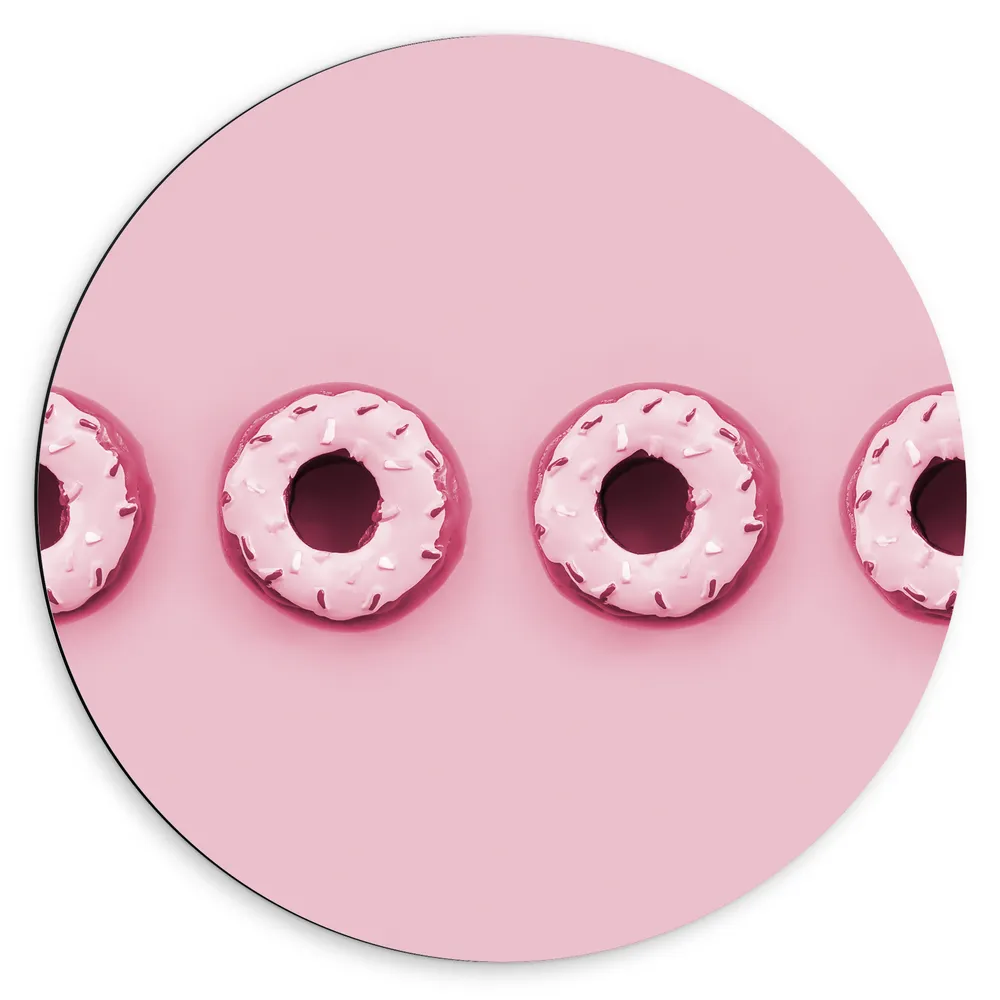 Dibond Muurcirkel - Vier Roze Donuts op een Rij tegen Roze Achtergrond