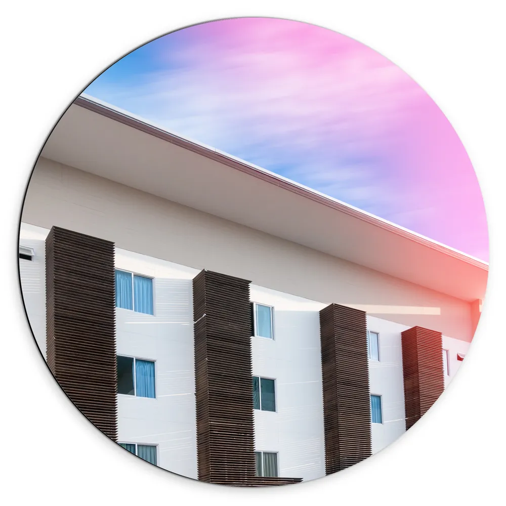 Dibond Muurcirkel - Meerkleurige Lucht boven Appartement