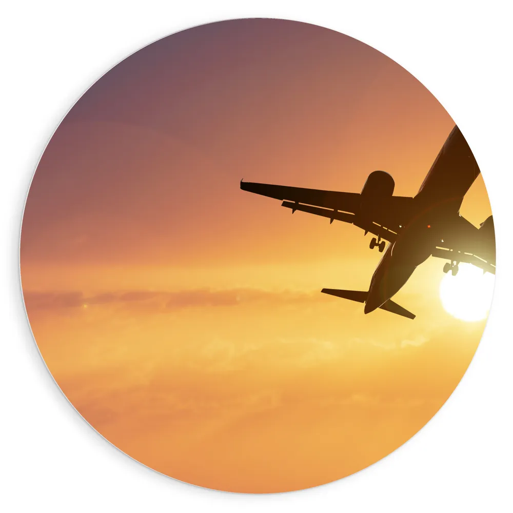 Dibond Muurcirkel - Silhouet van Passagiersvliegtuig Vliegend langs de Zon